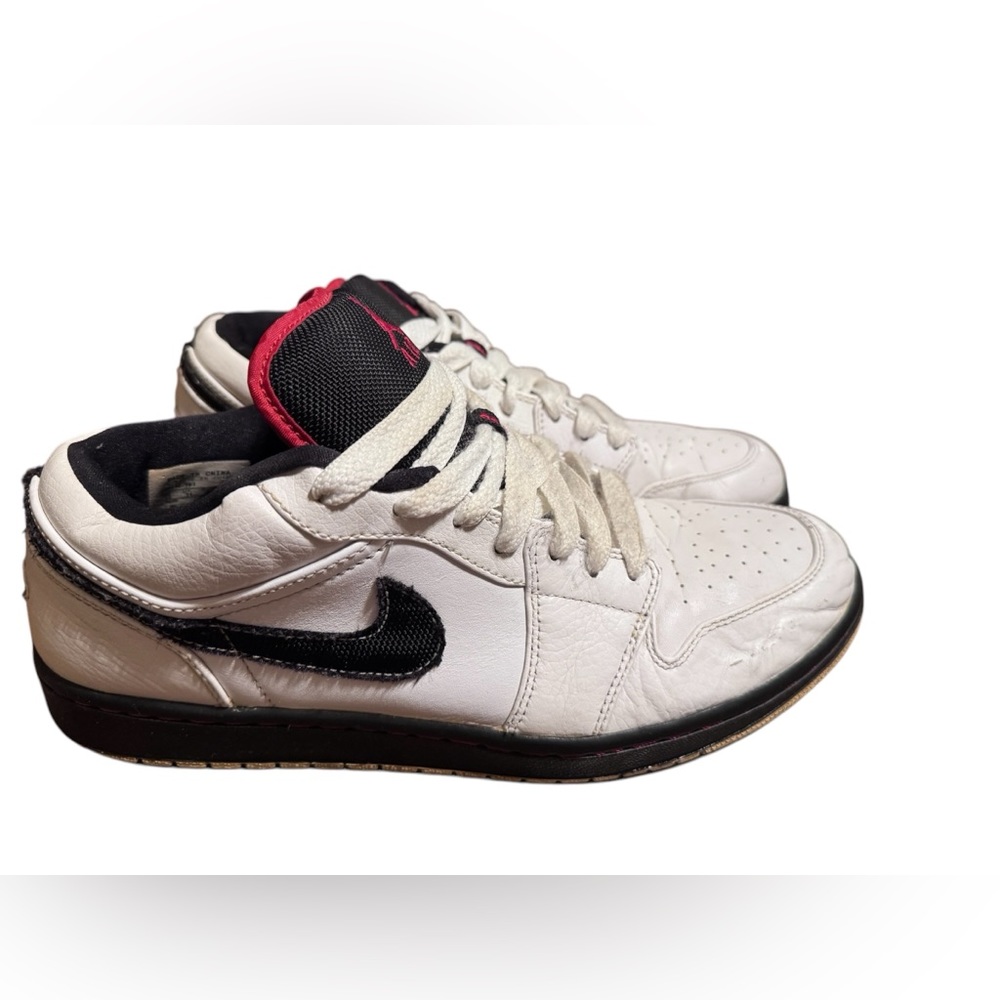 Nike is Air Jordan 1 Phat Low White, varsity Red & black Men’s size 12